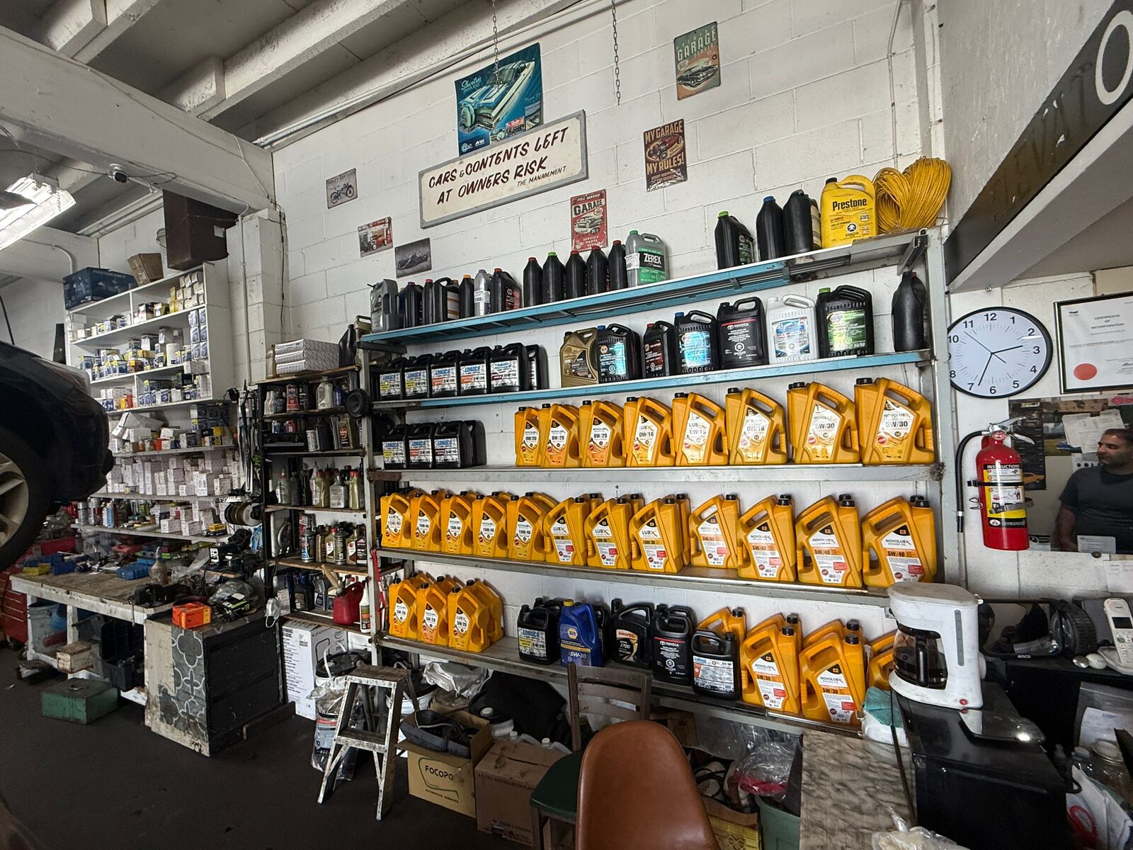 Shelves of oil and lubricants in the shop
